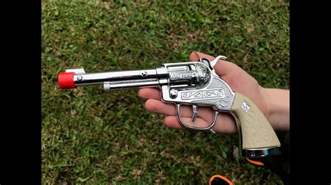 realistic cap gun revolver.